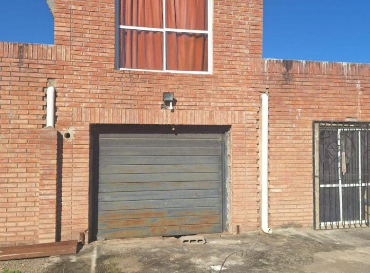 Casa · 210m² · 7 Ambientes · 1 Cochera