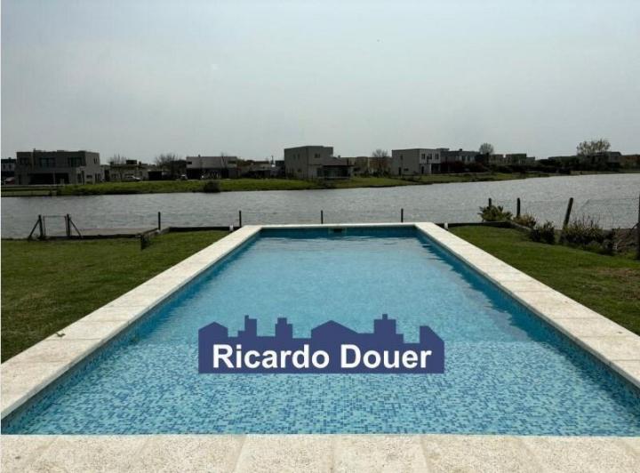Casa · 200m² · 5 Ambientes · 1 Cochera