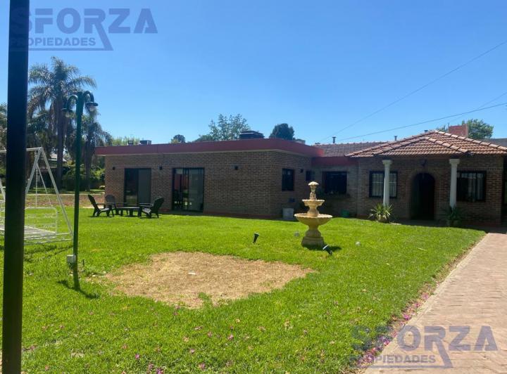 Casa · 7 Ambientes · 5 Cocheras