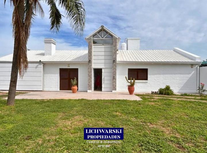 Casa · 500m² · 6 Ambientes · 2 Cocheras