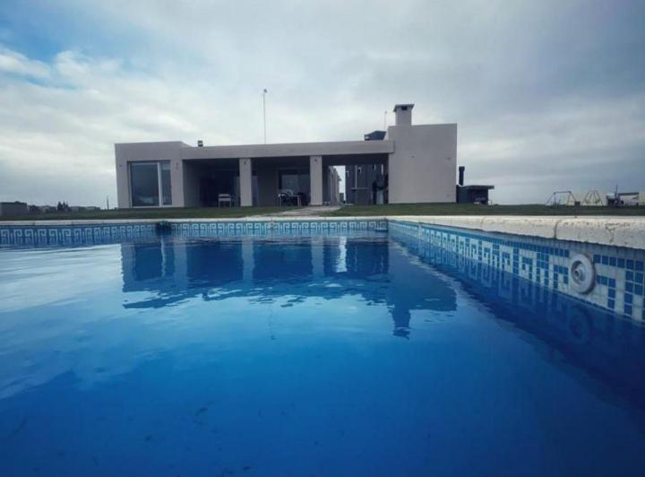 Casa · 200m² · 4 Ambientes · 2 Cocheras