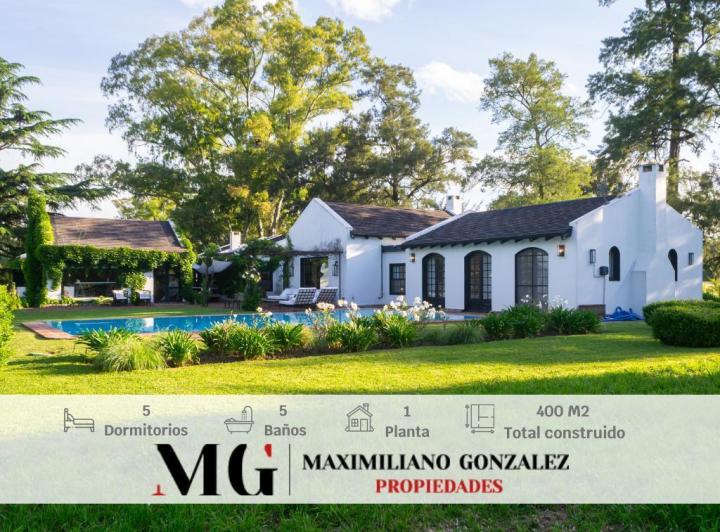 Casa · 400m² · 8 Ambientes · 1 Cochera
