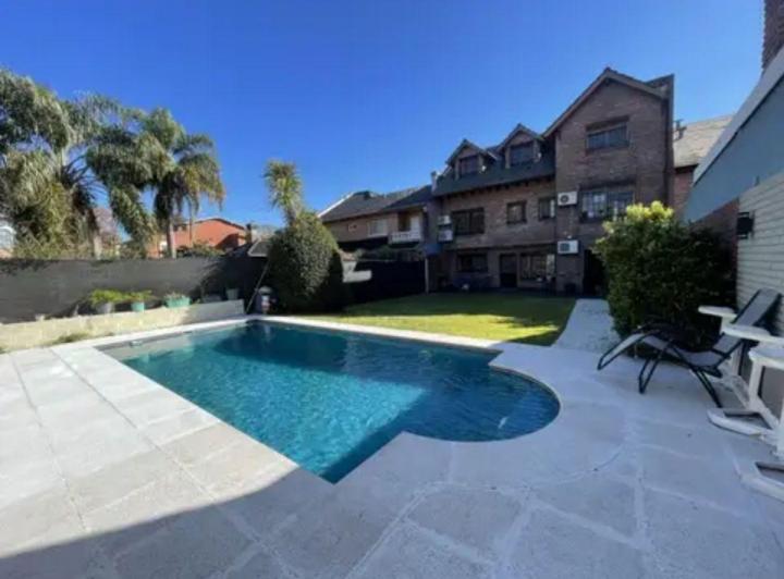 Casa · 400m² · 7 Ambientes · 2 Cocheras