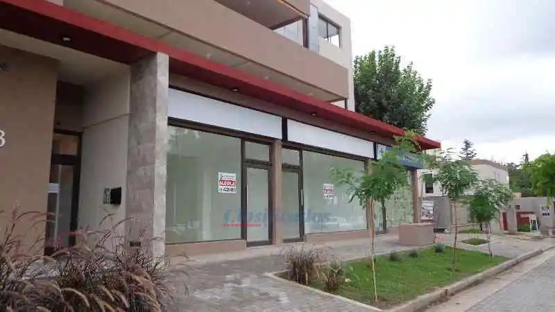ARGUELLO LOCAL 78M C/COCHERA  EN COMP. COMERCIAL-R. Rojas 7400