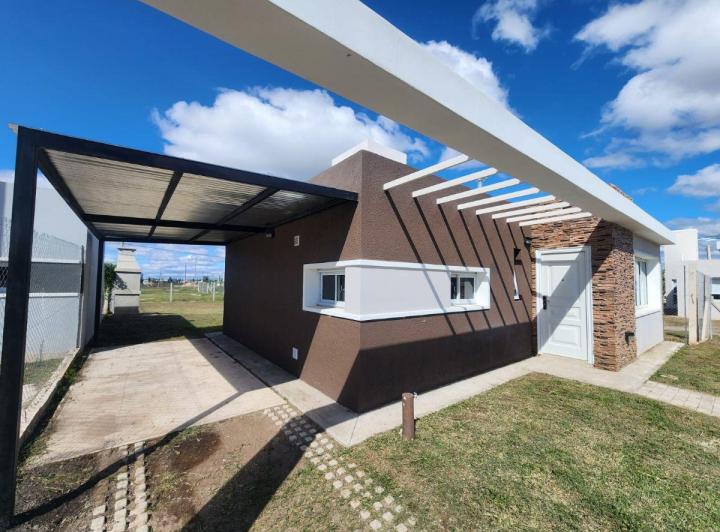 Casa · 80m² · 4 Ambientes · 1 Cochera