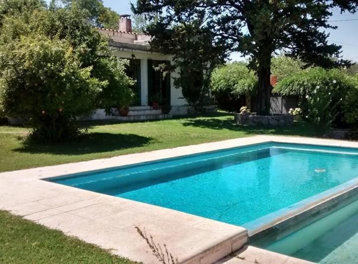 Casa · 250m² · 7 Ambientes · 2 Cocheras