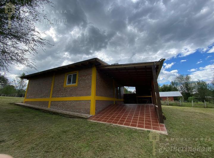 Casa · 122m² · 2 Dormitorios · 1 Cochera