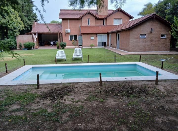 Casa · 286m² · 4 Dormitorios · 2 Cocheras