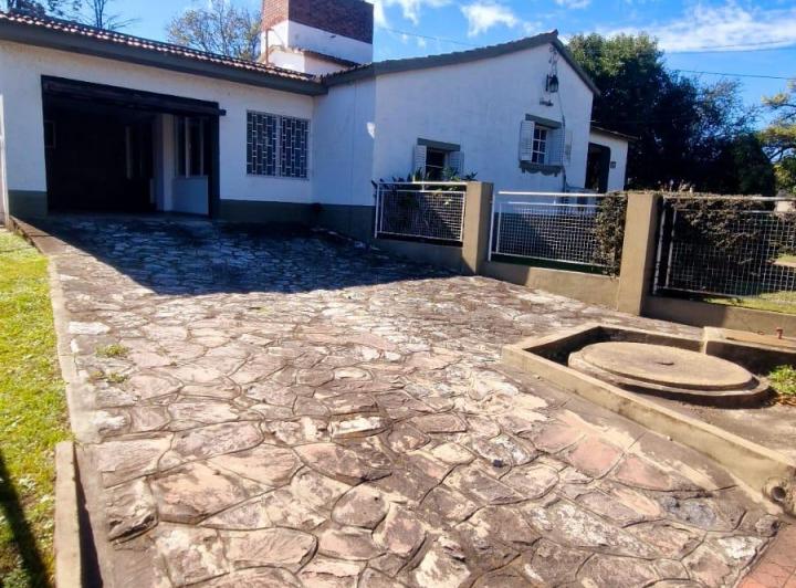 Casa · 210m² · 9 Ambientes · 1 Cochera