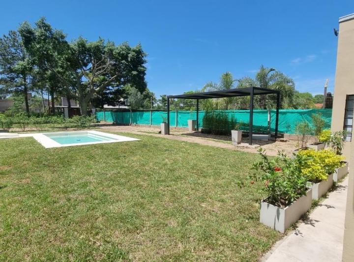 Casa · 100m² · 5 Ambientes · 2 Cocheras