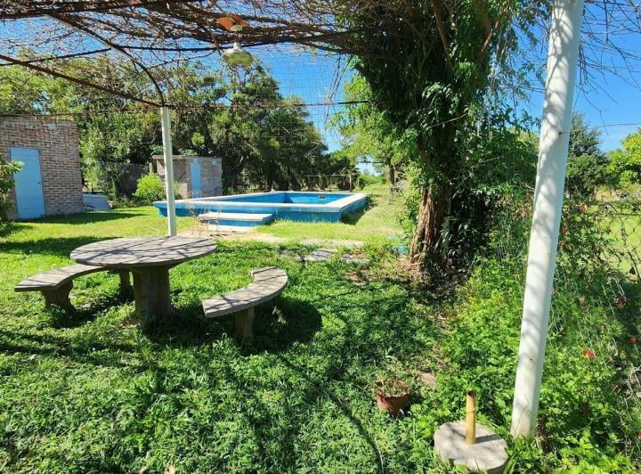 Casa · 245m² · 8 Ambientes · 1 Cochera