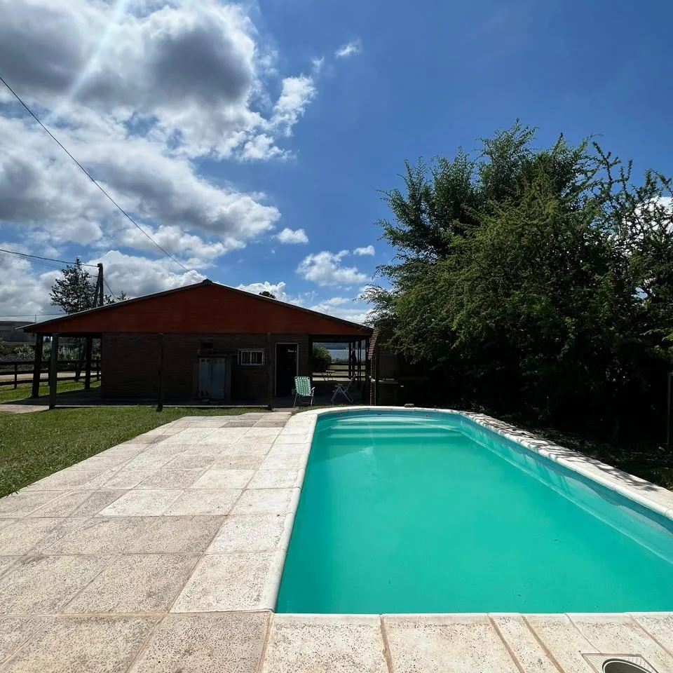 VENTA COMPLEJO DE 2 CABAÑAS FRENTE AL LAGO LOS MOLINOS  POTRERO DE GARAY
