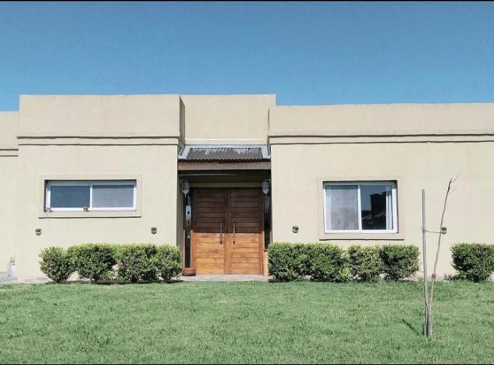Casa · 121m² · 4 Ambientes · 2 Cocheras