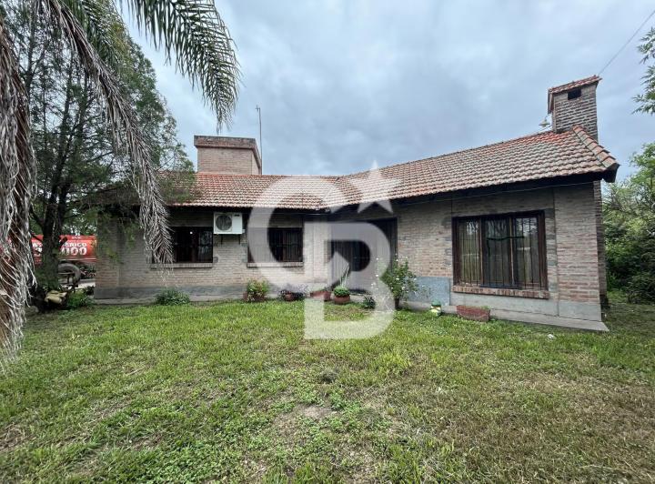 Casa · 1250m² · 6 Ambientes · 2 Cocheras