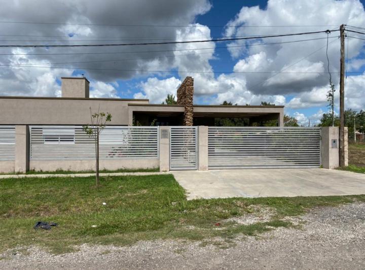 Casa · 200m² · 5 Ambientes · 1 Cochera