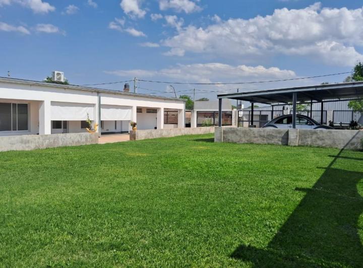 Casa · 318m² · 7 Ambientes · 4 Cocheras