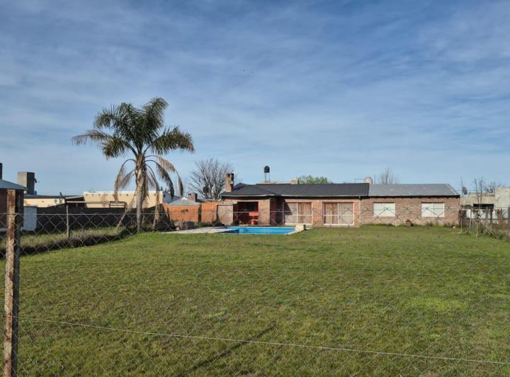 Casa · 80m² · 5 Ambientes · 1 Cochera