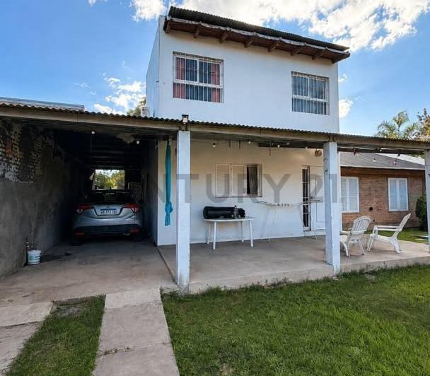 Casa · 228m² · 6 Ambientes · 2 Cocheras