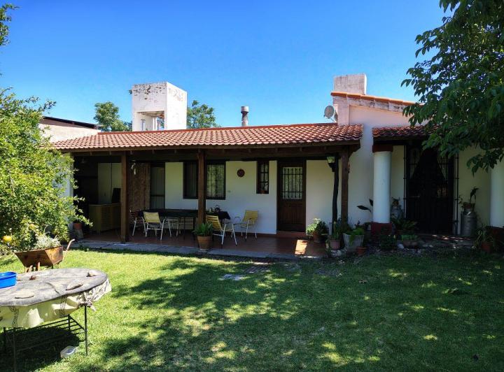 Casa · 400m² · 7 Ambientes · 4 Cocheras