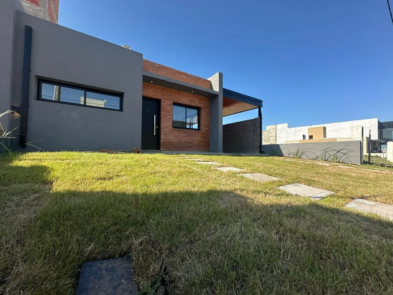 Venta casa 3 dormitorios a estrenar en Docta ( Malagueño )
