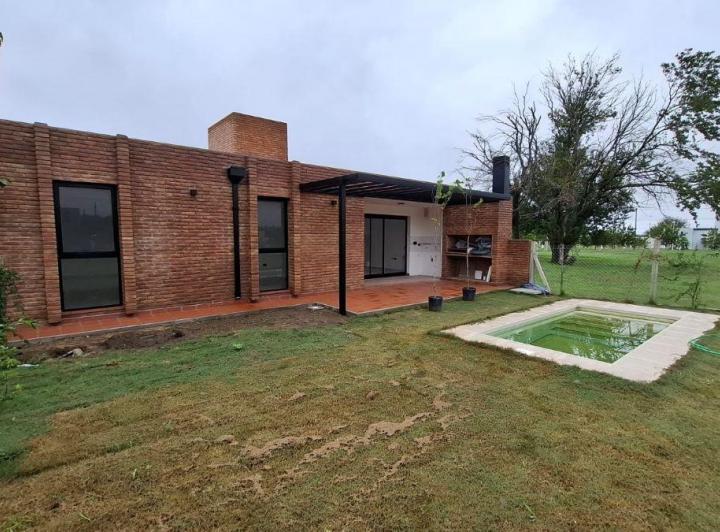 Casa · 165m² · 5 Ambientes · 2 Cocheras