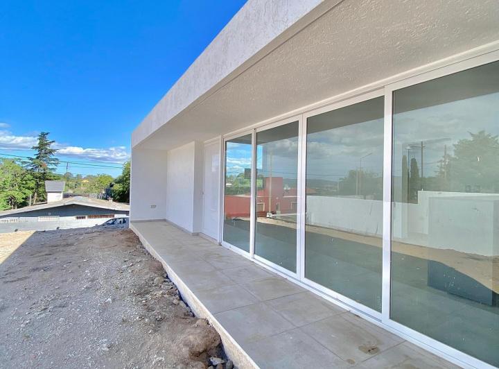 Casa · 84m² · 2 Dormitorios · 1 Cochera