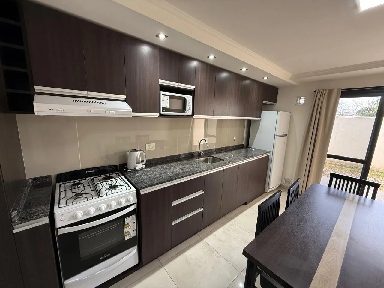 Venta: Departamento Triplex - 2 Dormitorios - Cochera, Patio, Terraza - Villa Domínguez - Carlos Paz