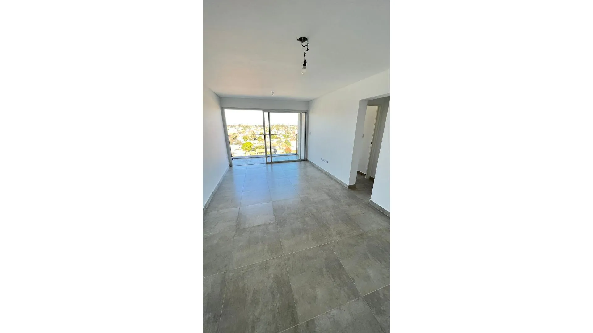DEPARTAMENTO DE 2 AMBIENTES CON COCHERA Y TERRAZA
