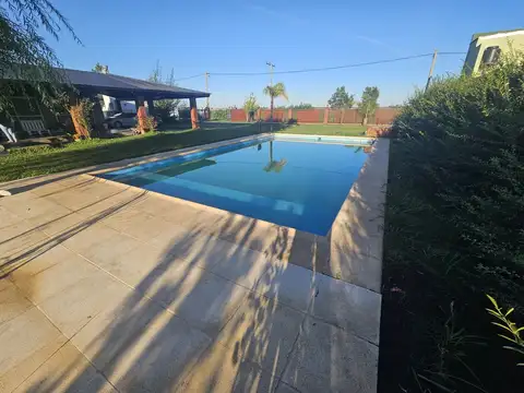 Casa en Venta en Punta Chacra, Roldan