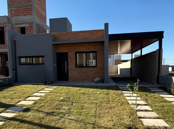 Casa · 127m² · 4 Ambientes · 2 Cocheras