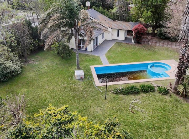 Casa · 125m² · 4 Ambientes · 6 Cocheras
