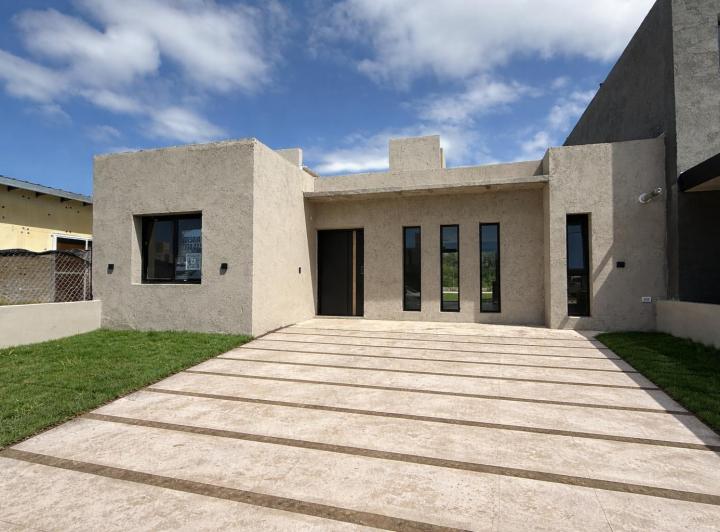Casa · 130m² · 5 Ambientes · 2 Cocheras