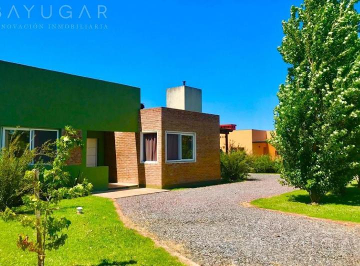 Casa · 128m² · 4 Ambientes · 5 Cocheras