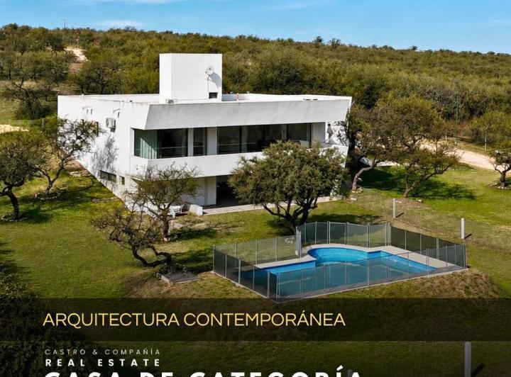 Casa · 400m² · 7 Ambientes · 2 Cocheras