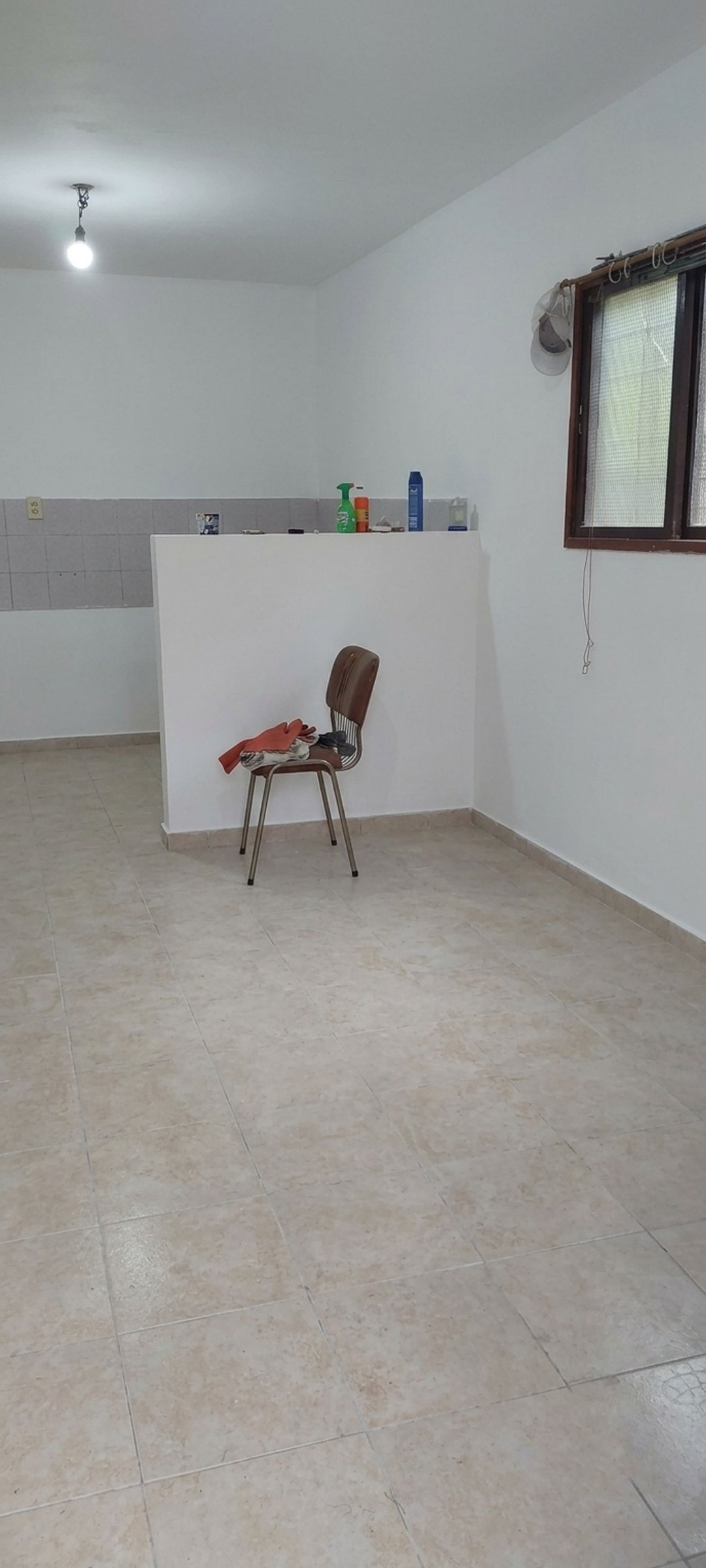 Lote con casa en venta en Benavidez para refacción