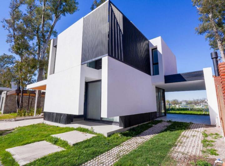 Casa · 125m² · 4 Ambientes · 2 Cocheras