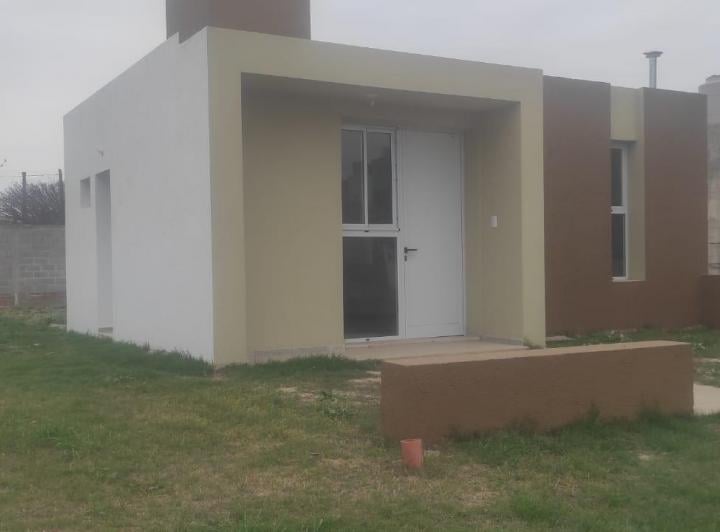Casa · 2 Dormitorios · 1 Cochera