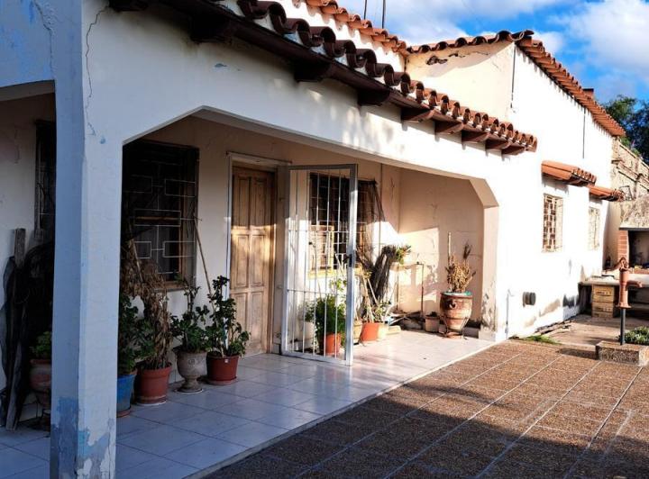 Casa · 400m² · 5 Ambientes · 1 Cochera