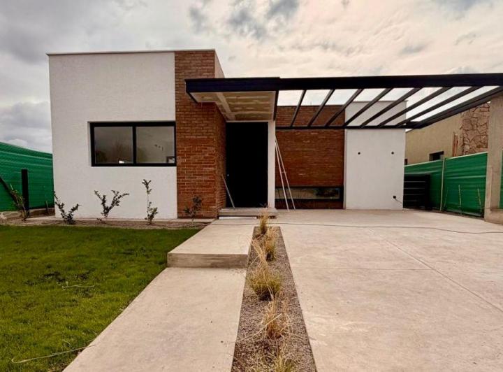 Casa · 125m² · 6 Ambientes · 1 Cochera