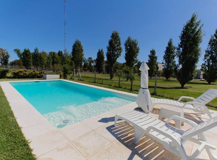 Casa · 130m² · 4 Ambientes · 3 Cocheras
