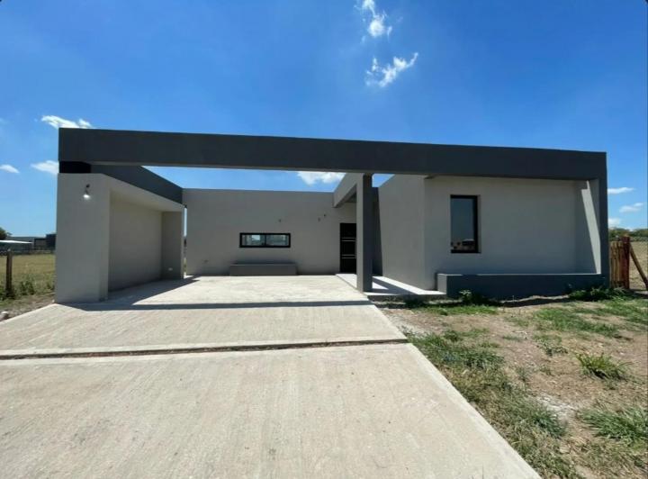 Casa · 125m² · 4 Ambientes · 2 Cocheras