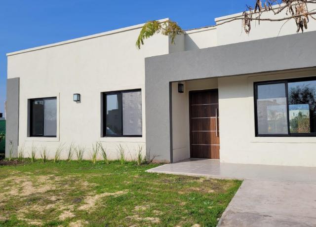 Casa · 100m² · 4 Ambientes · 1 Cochera