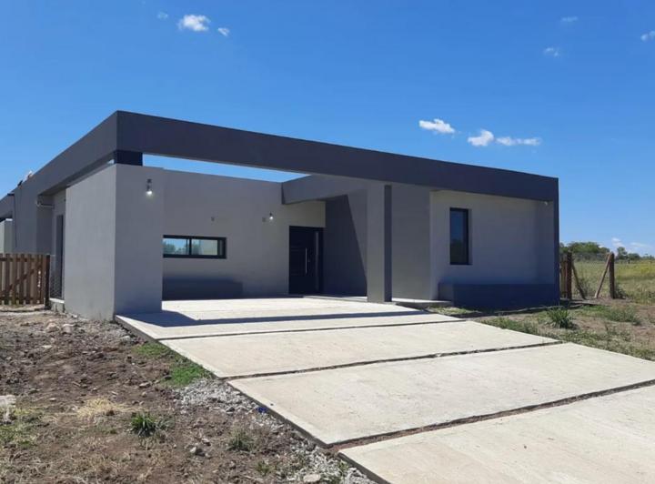 Casa · 125m² · 4 Ambientes · 2 Cocheras
