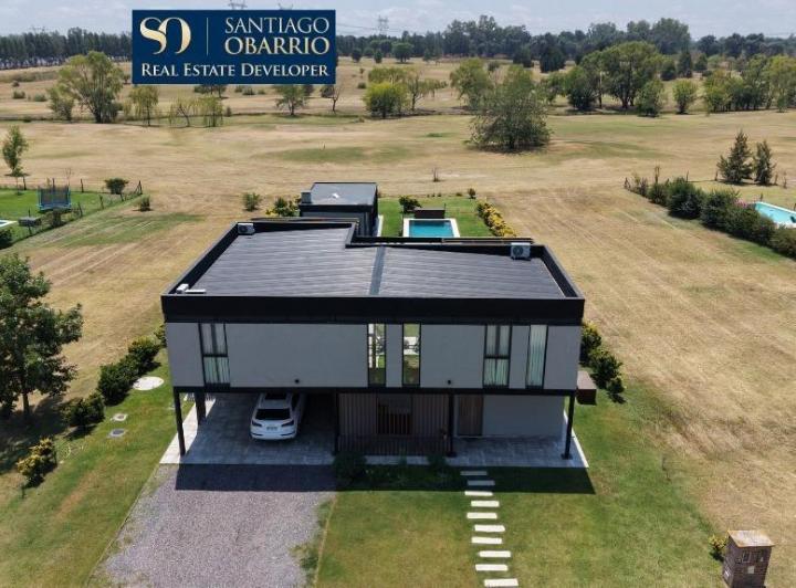 Casa · 320m² · 5 Ambientes · 2 Cocheras