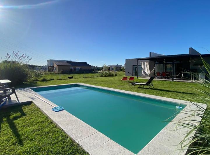 Casa · 162m² · 4 Dormitorios · 6 Cocheras