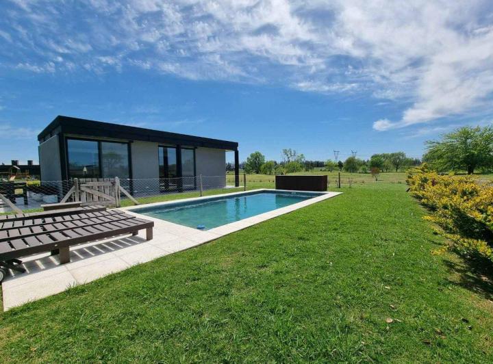 Casa · 260m² · 5 Ambientes · 2 Cocheras