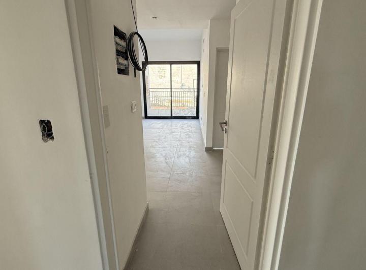 Departamento · 57m² · 2 Ambientes · 1 Cochera