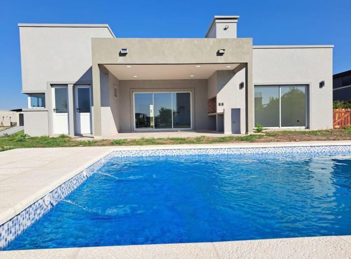 Casa · 170m² · 4 Ambientes · 1 Cochera