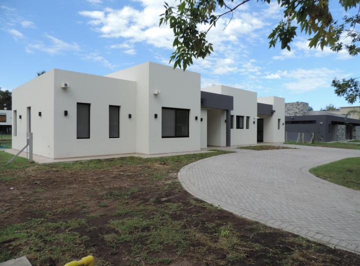 Casa · 125m² · 4 Ambientes · 2 Cocheras