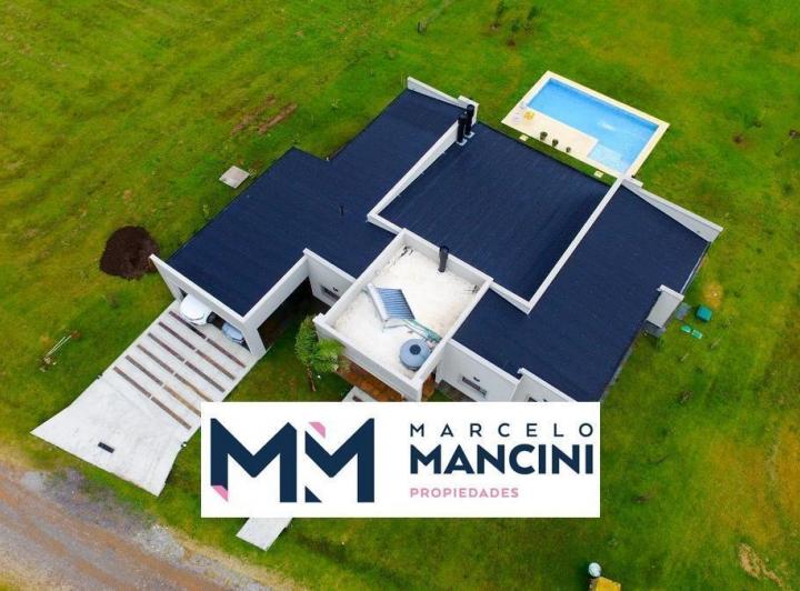 Casa · 400m² · 6 Ambientes · 1 Cochera